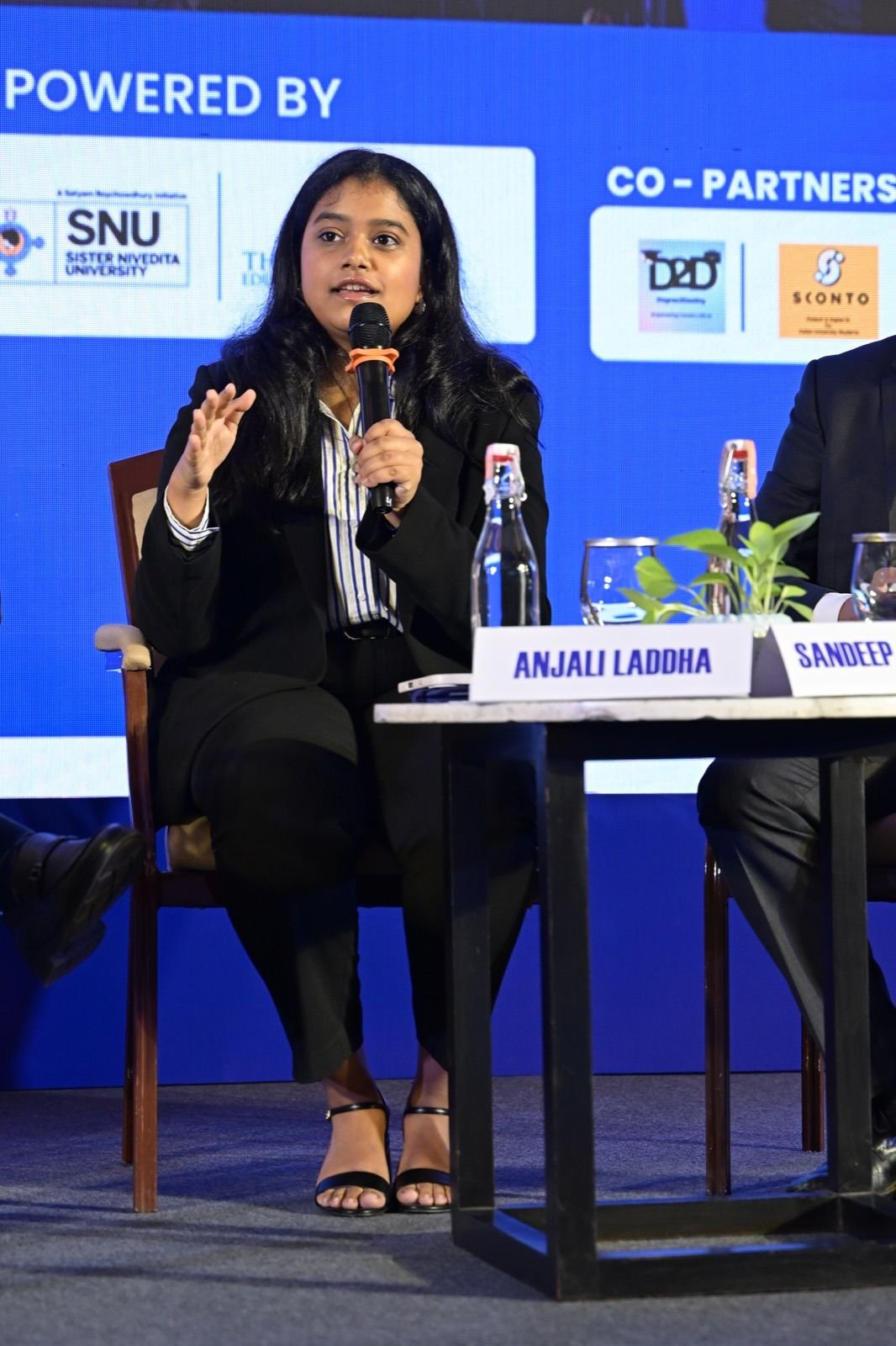 Anjali Laddha speaking on an AI panel in India