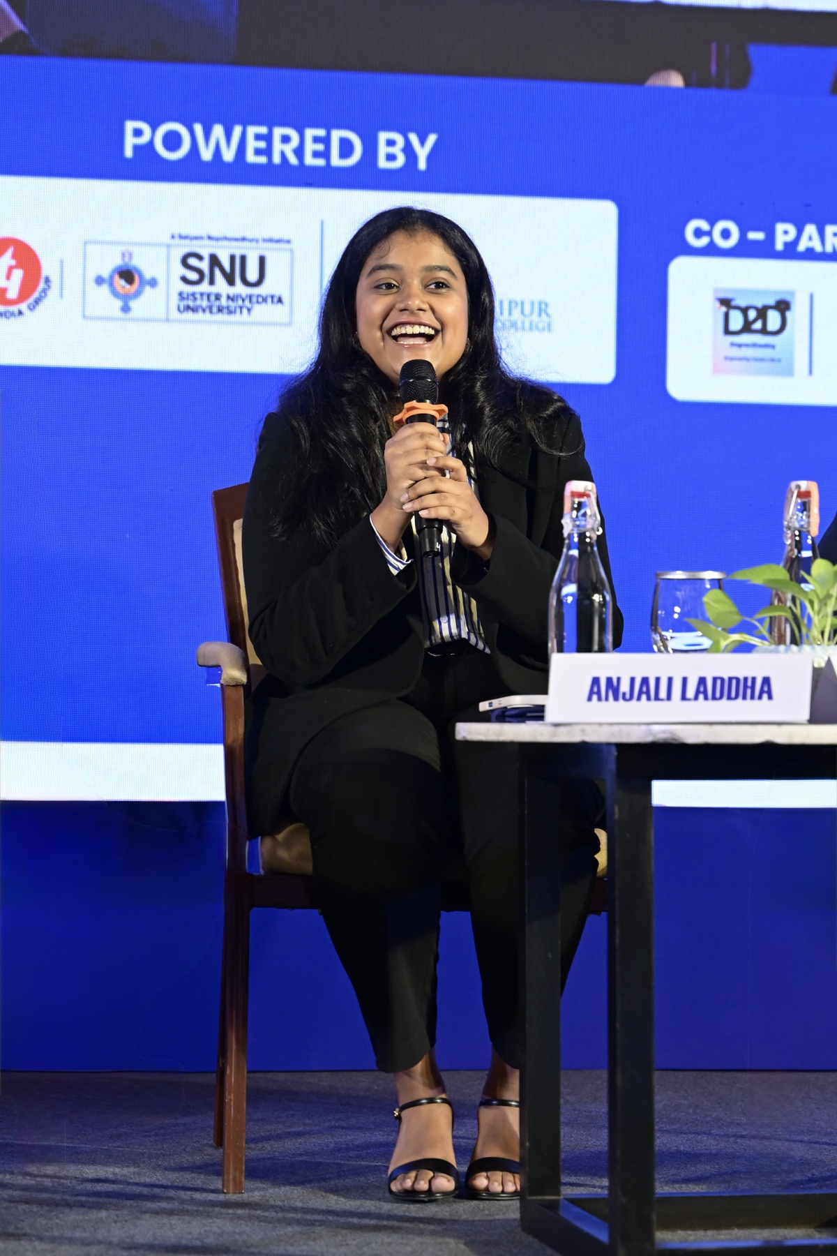 Anjali Laddha speaking on an AI panel in India